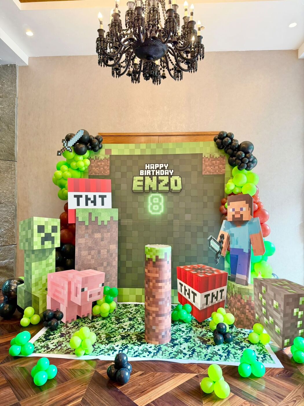 A Minecraft-themed birthday backdrop built by LinkNow Events Co. for Enzo's 8th birthday